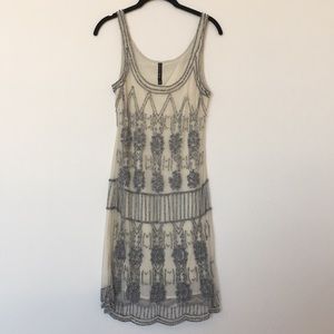 White and silver beaded flapper dress